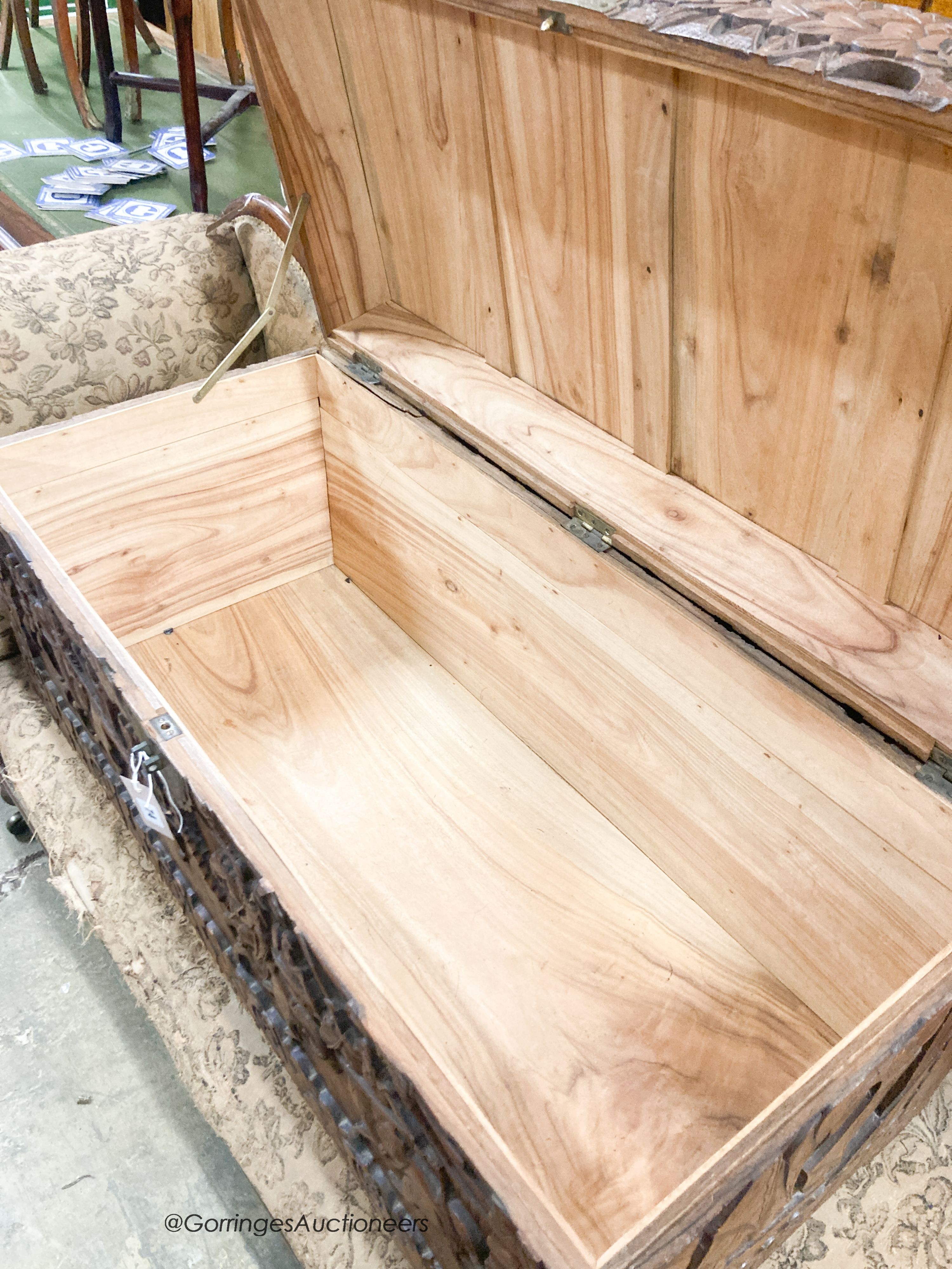 A Cantonese carved hardwood chest, length 104cm, depth 46cm, height 49cm